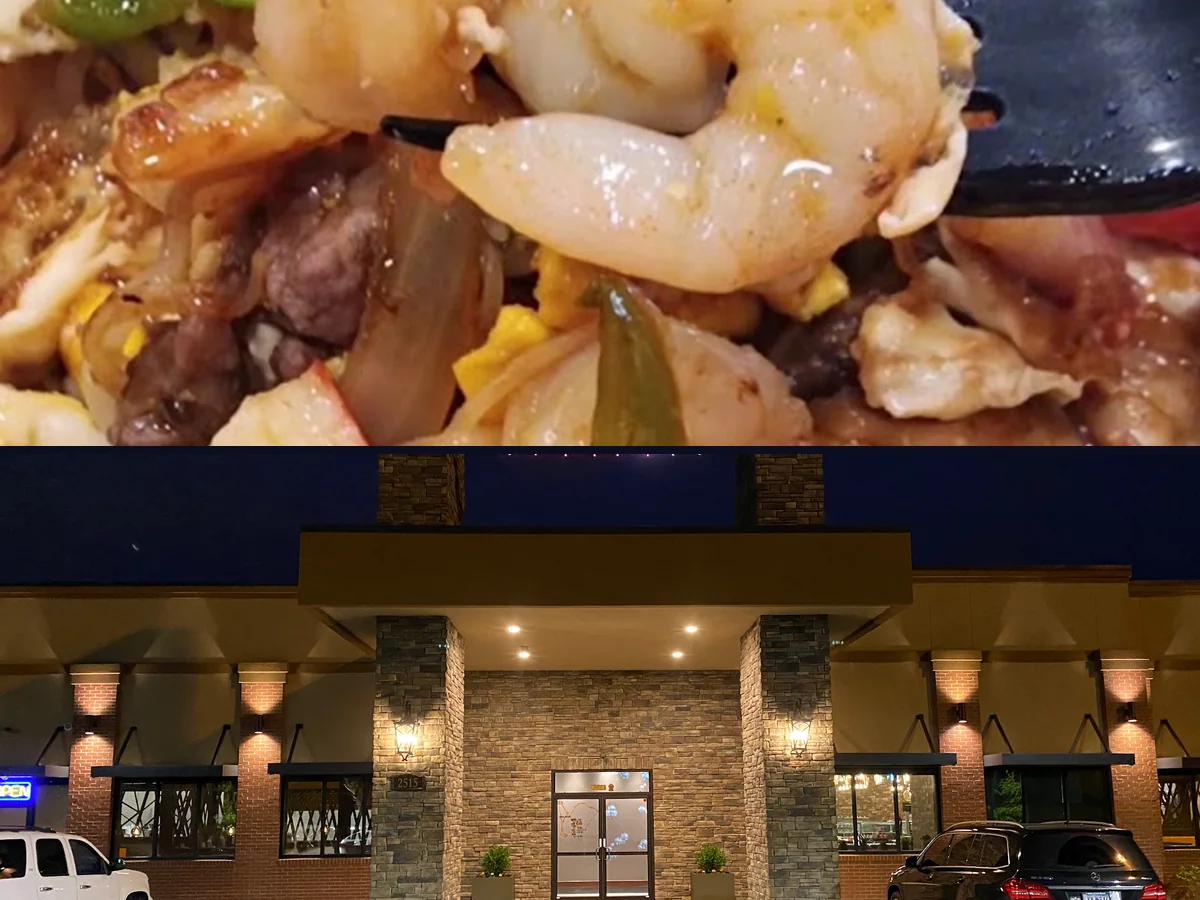 Spacious restaurant interior with a welcoming buffet setup.